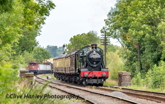 With the mineral train disappearing around the bend 6990 Witherslack Hall appears with the 11.20