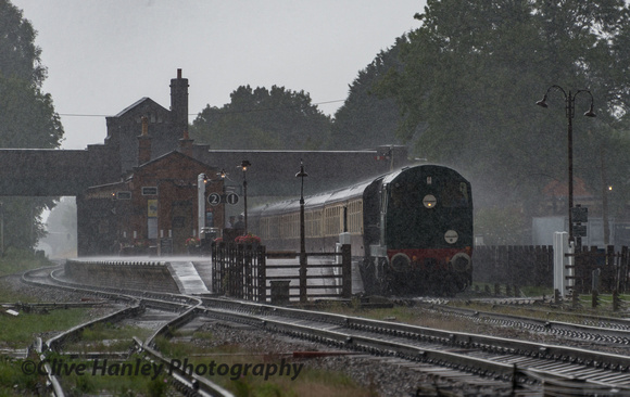 A sudden heavy shower of rain fell as D8098 sat in Quorn station.