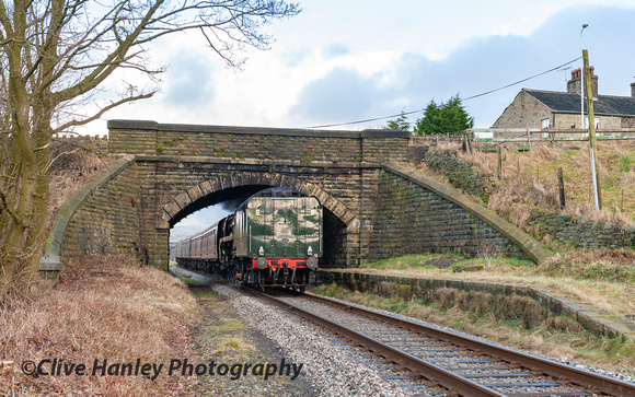The remains of Ewood Station as 71000 passes through.