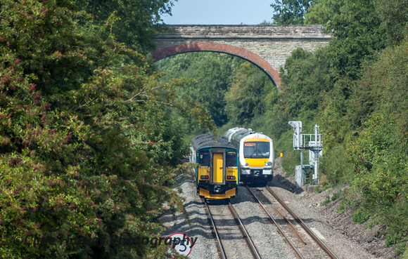 As a Class 150 unit heads north the Chiltern unit was still held at the signals. 13.24