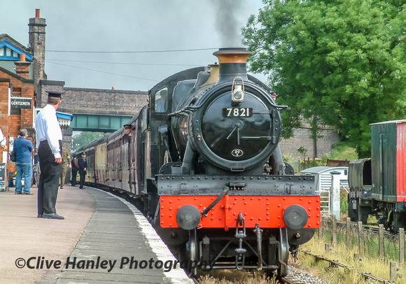 GWR Manor Class 4-6-0 no 7821 Ditcheat Manor arrives at Quorn & Woodhouse station.