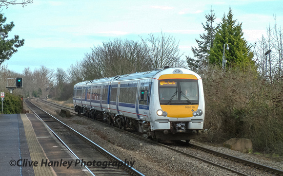 Unit no 168218 arrives at Warwick from the south.
