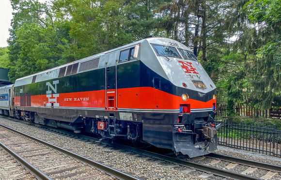 Metro North loco in heritage  colours: New York, New Haven and Hartford Railroad at Cold Spring NY.