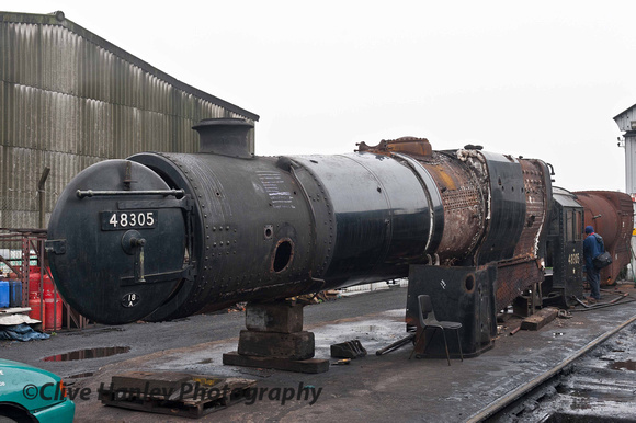 The boilers of Stanier 8F no 48305 and 6990 Witherslack Hall stand outside Loughborough Works