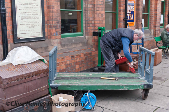 This luggage trolly was getting an overhaul. I dont know what wet the chaps trousers though.