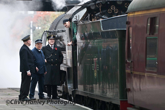Station staff chat with the fireman/Driver?? on 30777 Sir Lamiel.