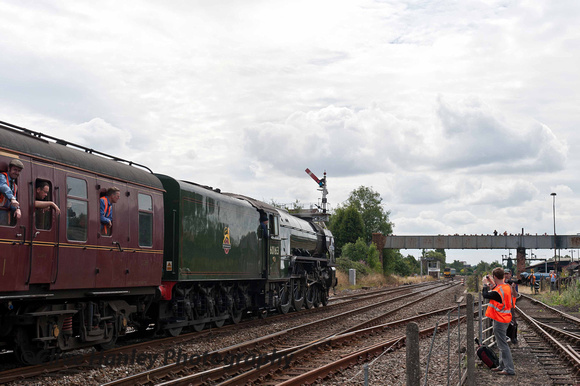 With Graham Bunker, boss of Steam Dreams, hanging out of the left most window 60163 heads away from Kidderminster.