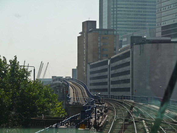 Approaching the skyscrapers of Canary Wharf and our train is about to take the left junction.