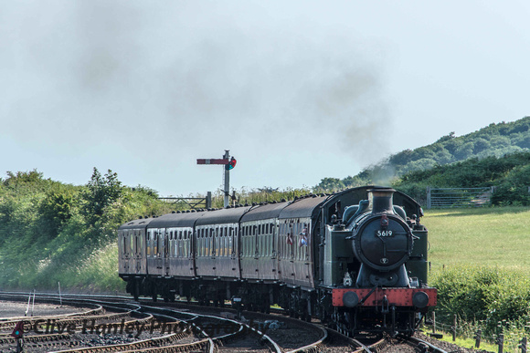 GWR 0-6-2T no 5619 brings its train around the curve towards Weybourne