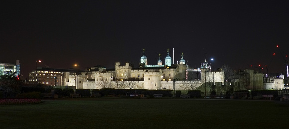 The Tower of London with Tower Bridge visible in the background.
