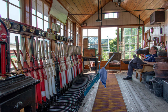 The signalman takes a break in the signalbox at Weybourne.