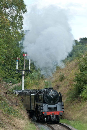 9F no 92212 departs Arley with the 1st train of the day from Bridgnorth.