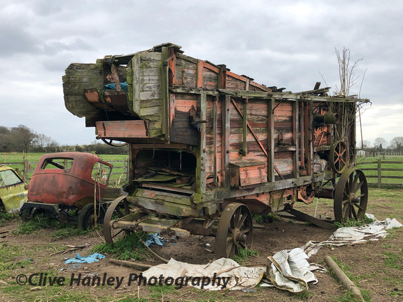 A vintage farm threshing machine.