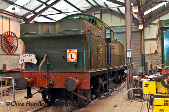 GWR 2-8-2T no 7202 progresses slowly through the works