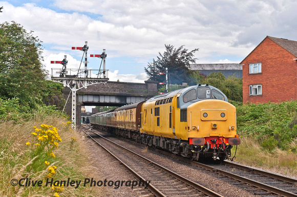 Class 37 no 37198 hauls its train under Beeches Road bridge on its departure from Loughborough.
