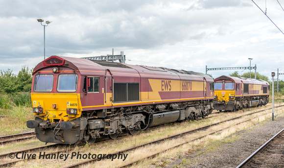 EWS Class 66 no 66070 sits alongside DB Class 66 no 66099