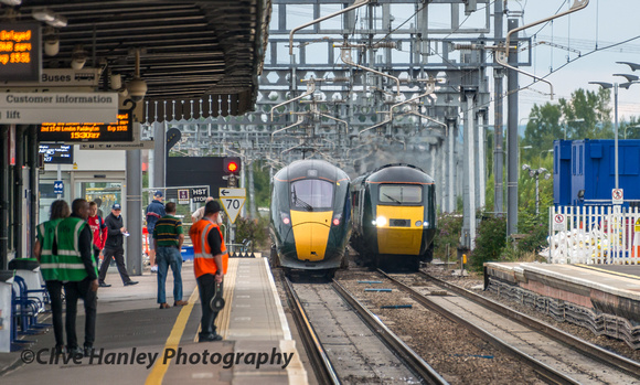 As the new Class 800 departs the 14.45 from Paddington to Swansea gets underway after being held at the signals.