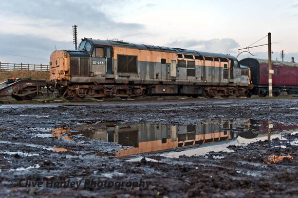 The muddy state of the car park at Quorn. Churned up following track panel work taking place here.