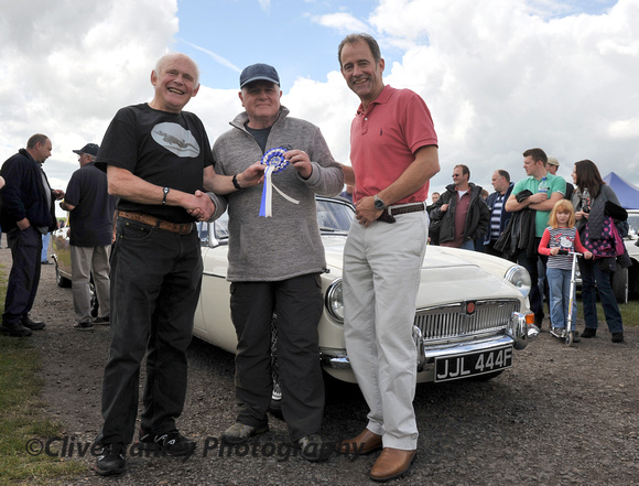 Second prize in the Wheels section went to: Mr Ray Reeder in a MGC Roadster