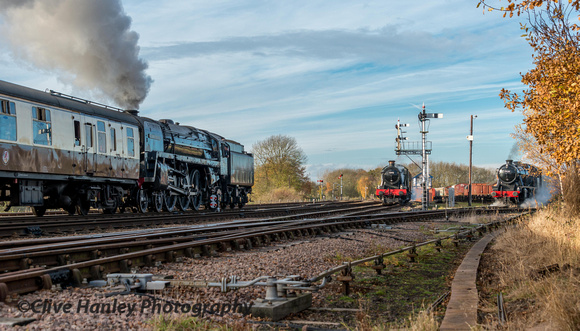 70013 Oliver Cromwell heads north and is seen passing 6990 Witherslack Hall & 48624