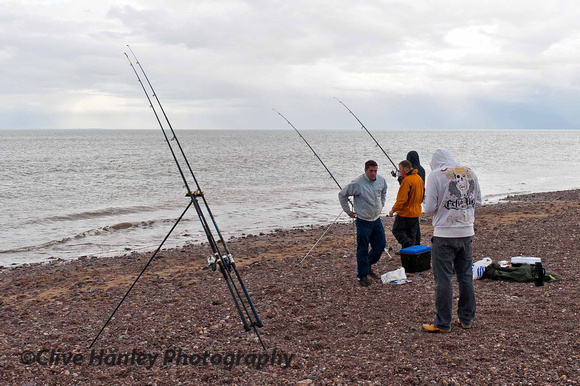 Some hardy fishermen were braving the chilly weather on Blue Anchor beach.