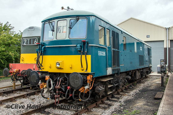 Electro-Diesel E6036 stands alongside a Class 20 D8137.