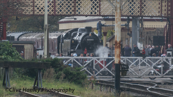 80080 takes water from the column at Ramsbottom having arrived with the parcels train.
