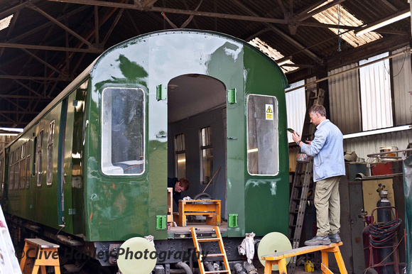 A DMU carriage that has been overhauled receives a lick of paint.