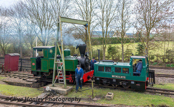 Down on the narrow gauge line one of their locos was receiving a warming fire.