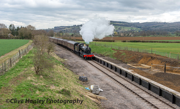 Back at Hayles Abbey bridge 7822 Dinmore Manor passes through with the final steam hauled trip of the day.