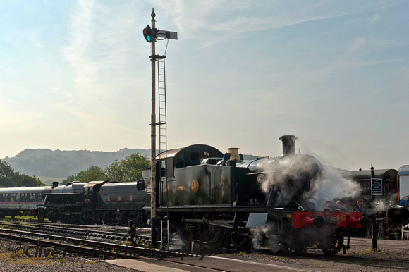 On shed at Winchcombe was GWR small Prairie 2-6-2T no 5542. Stanier 8F no 8274 stands in the sidings