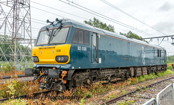 Outside the fence on Caledonian Sleeper standby duty was Class 92 no 92038. In the drabbest livery EVER.