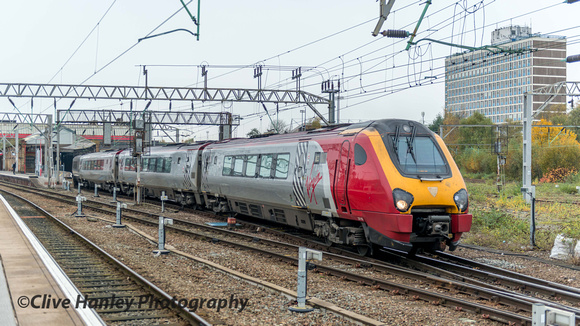 A Virgin Voyager departs 11 towards Chester with the 11.10 from Euston