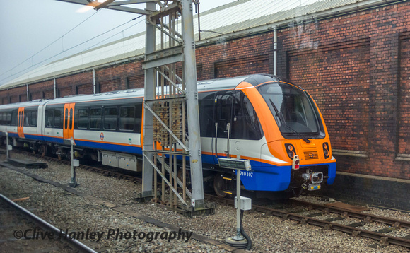 A Crossrail unit 710107 was parked out of use.
