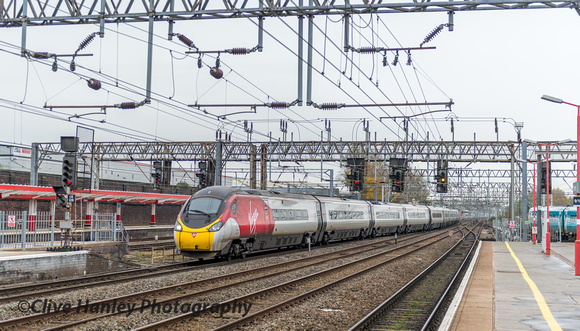11.40 Pendolino from Euston to Manchester Piccadilly moves onto platform 5 as a Transport for Wales train from Shrewsbury arrives into 8