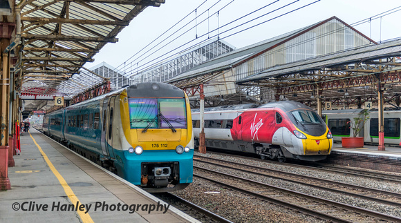 Transport for Wales unit 175112 (in Arriva Trains Wales Livery) departs from platform 6 with the 12.31 Manchester Piccadilly to Milford Haven