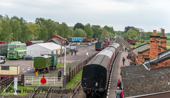 The scene at Quorn as D5185 heads south. Hall Class no 6990 Witherslack Hall sits in the sidings.
