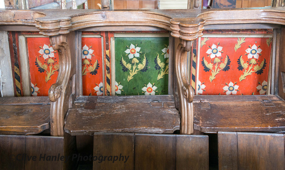 Hidden behind the MISERICORD seats in the chancel are several original painted Rood Screen panels