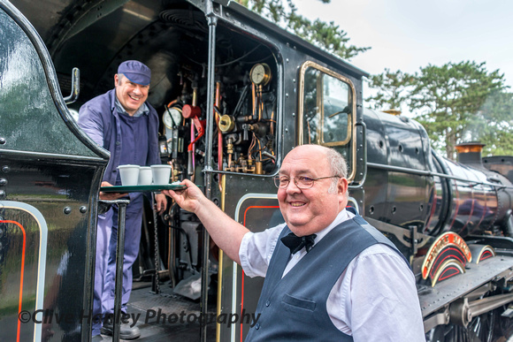 Waiter service with drinks for the footplate crew.