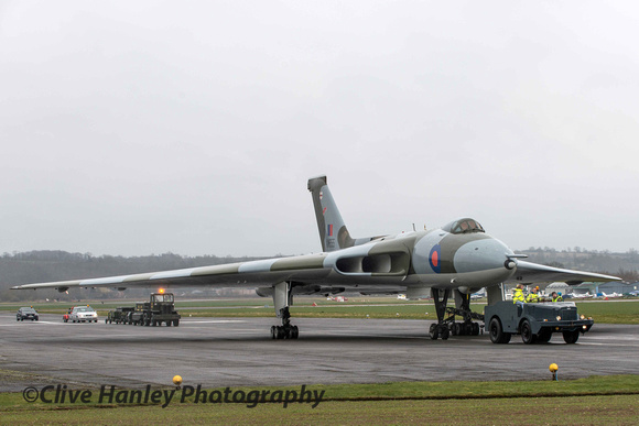 XM655 has now reached the end of the runway and begins the turn onto the taxiway.