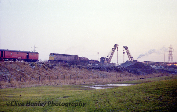 Two steam cranes and 3 Class 25's in shot with the River Alt bridge replacement.