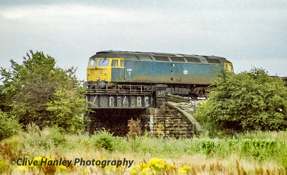 Class 47 no 47137 on the Leeds-Liverpool canal bridge south of Maghull.