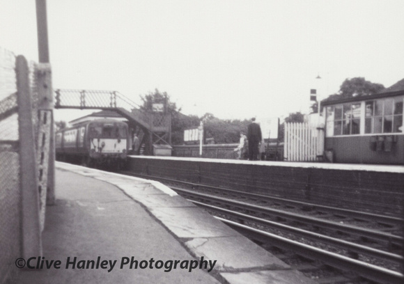 A Class 502 3 car EMU draws to a halt at Maghull station in 1964
