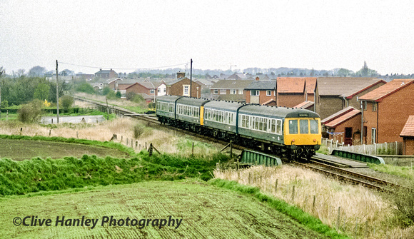 I have no idea what this "Special" 4 car DMU was. It's seen heading north between Rufford and Croston