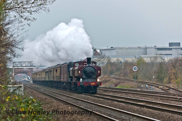 The two 0-6-0 pannier tank locos hauling the Vintage Trains excursion appear on the fast line!