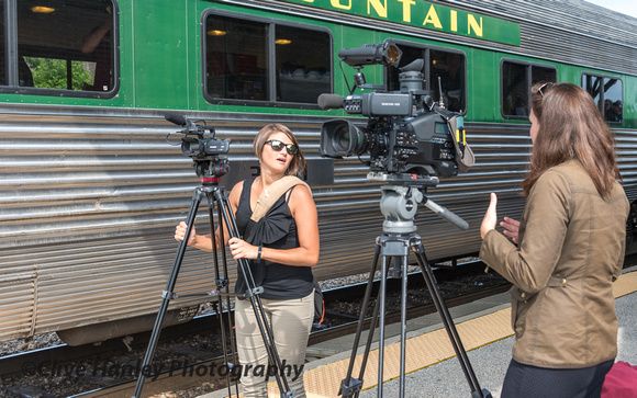WCAX videographer Eliza Larson records the scene at Rutland with a fellow videographer.