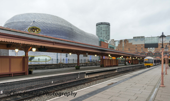 The modern architecture of the Selfridges Building slashes with the old style of the new Moor Street station.