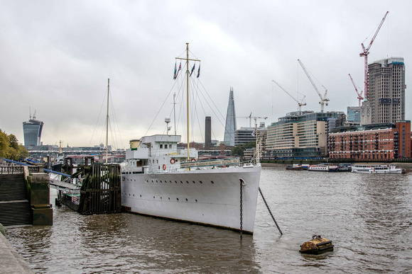 The vessel is moored on the Thames opposite the Royal Festival Hall.
