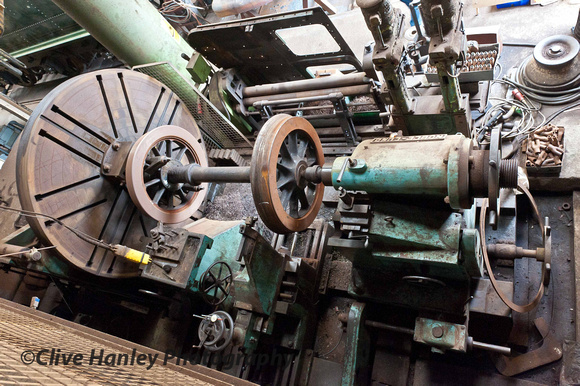 An overhead shot of the wheel lathe within the workshop