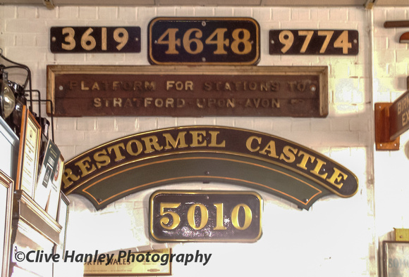 Several loco nameplates and numbers adorn the museum walls.